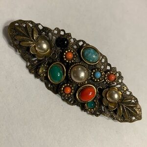 EDWARDIAN VICTORIAN NEIGER BROTHERS-STYLE BROOCH WITH MULTICOLORED CABOCHONS.